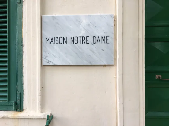 Maison Notre Dame name plate.